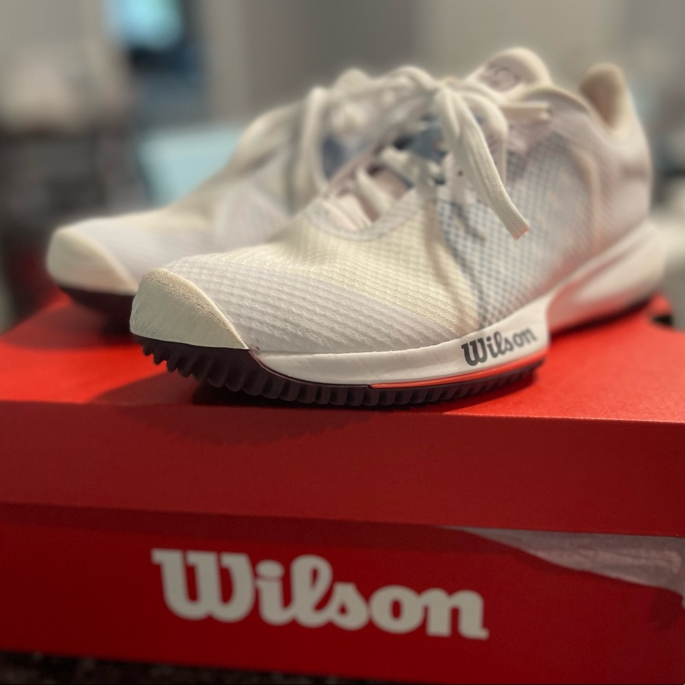 Women’s size 7 Wilson Kaos Swift are like new with the box.
